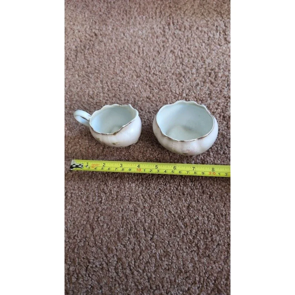 Vintage Porcelain Creamer and Sugar Bowl Set with Floral Design